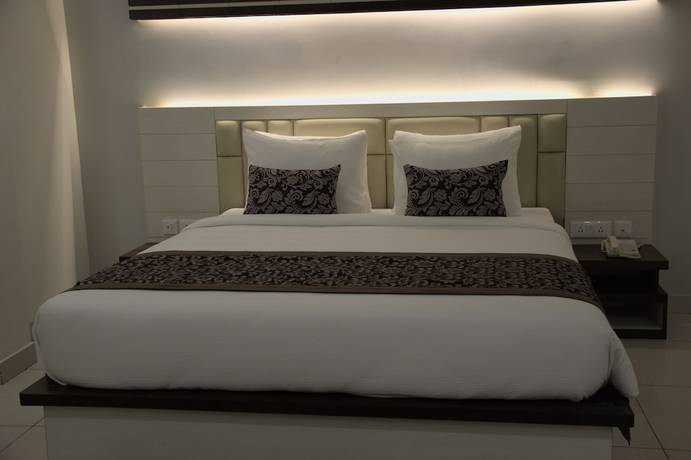 Imagen de la habitación del Hotel Pride Biznotel Canopus Digha. Foto 6