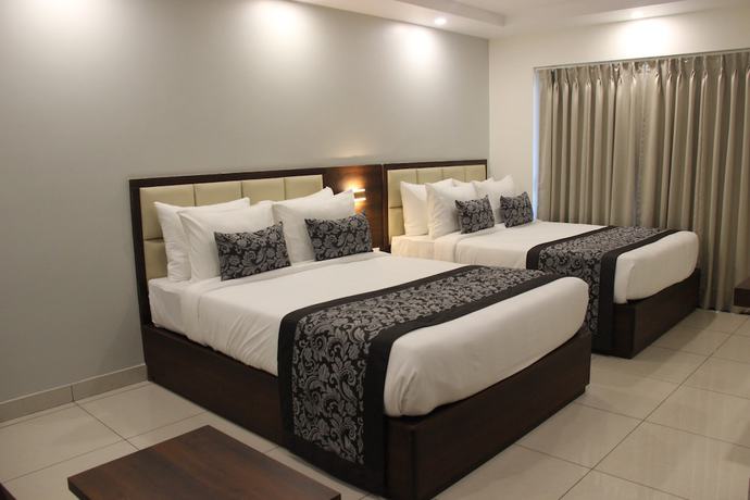 Imagen de la habitación del Hotel Pride Biznotel Canopus Digha. Foto 7