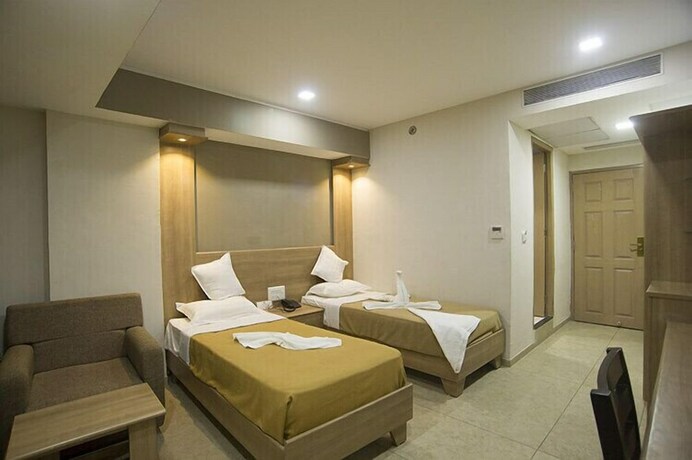 Imagen de la habitación del Hotel Pride Biznotel - The Maison Anand. Foto 21