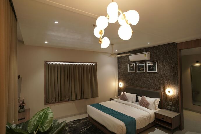 Imagen de la habitación del Hotel Pride Comfort Dwarka. Foto 13
