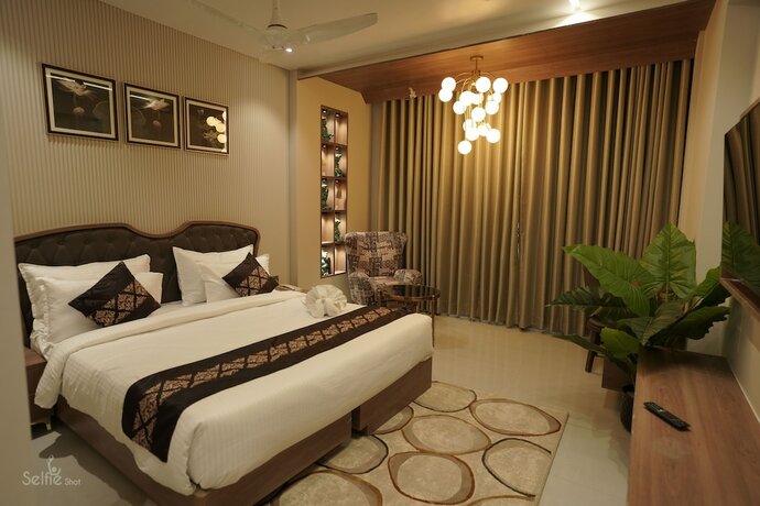 Imagen de la habitación del Hotel Pride Comfort Dwarka. Foto 19