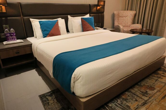 Imagen de la habitación del Hotel Pride Comfort Dwarka. Foto 21