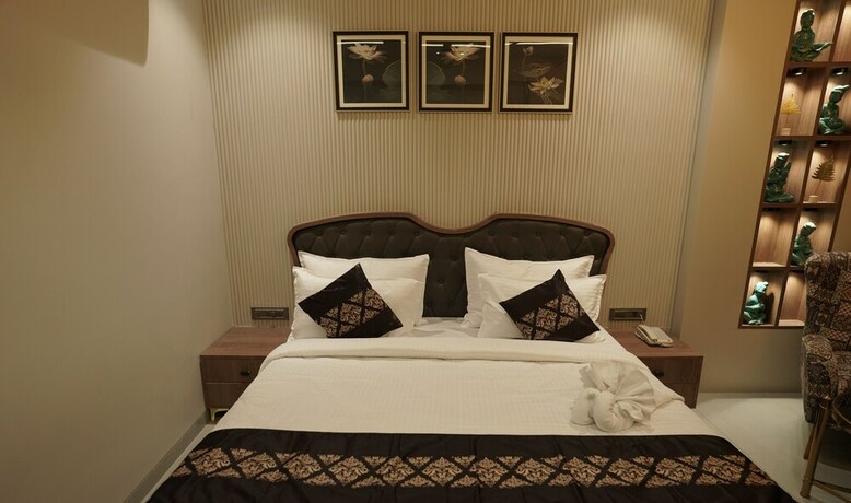 Imagen de la habitación del Hotel Pride Comfort Dwarka. Foto 25