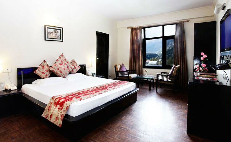 Imagen de la habitación del Hotel Pride De Vivendi Resort Manali. Foto 20