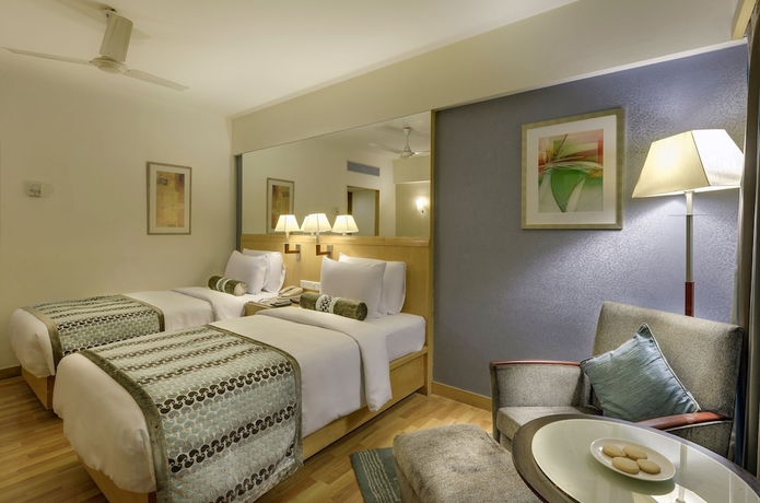 Imagen de la habitación del Hotel Pride Plaza , Ahmedabad. Foto 5