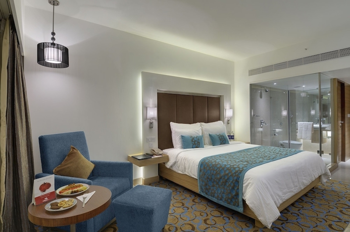 Imagen de la habitación del Hotel Pride Plaza , Ahmedabad. Foto 6