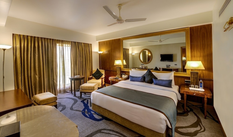 Imagen de la habitación del Hotel Pride Plaza , Ahmedabad. Foto 8