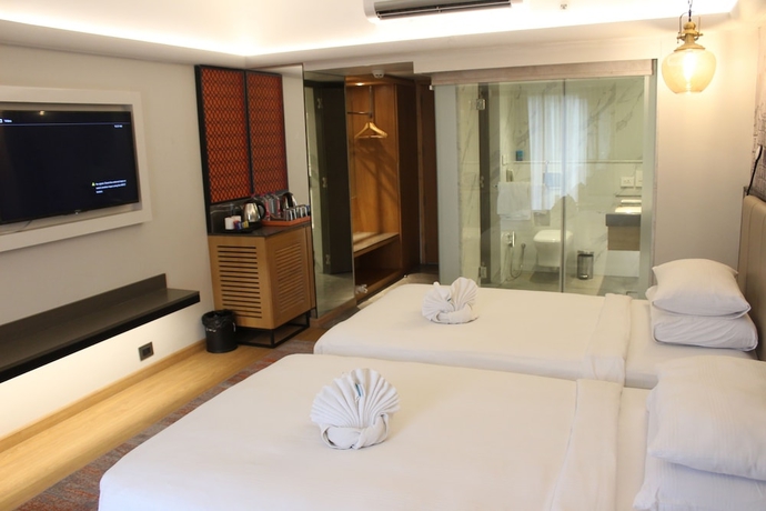 Imagen de la habitación del Hotel Pride Plaza , Ahmedabad. Foto 10