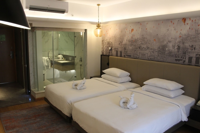 Imagen de la habitación del Hotel Pride Plaza , Ahmedabad. Foto 11