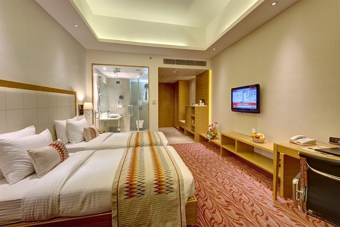 Imagen de la habitación del Hotel Pride Plaza , Kolkata. Foto 4