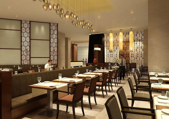 Imagen del bar/restaurante del Hotel Pride Plaza , Kolkata. Foto 3
