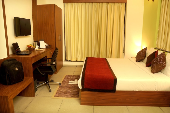 Imagen de la habitación del Hotel Pride Resort and Convention Centre. Foto 9