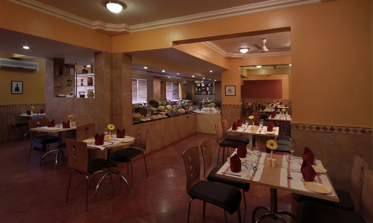 Imagen del bar/restaurante del Hotel Pride Sun Village Resort and Spa. Foto 2