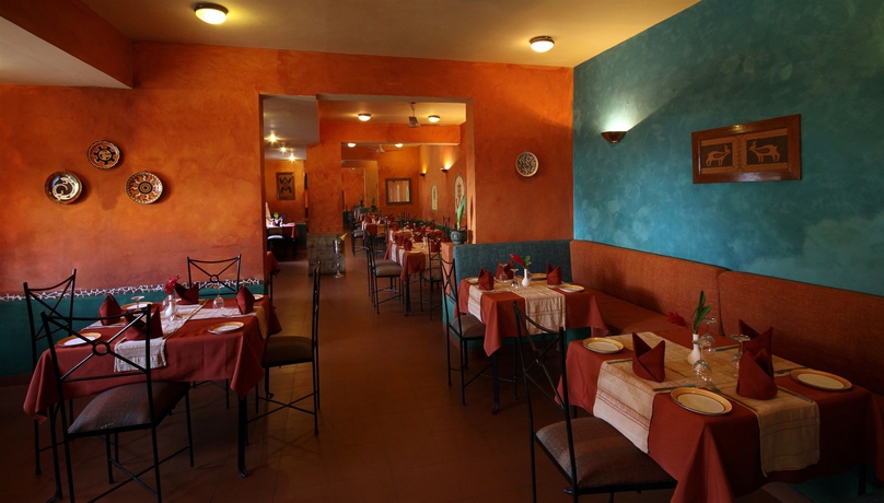Imagen del bar/restaurante del Hotel Pride Sun Village Resort and Spa. Foto 3