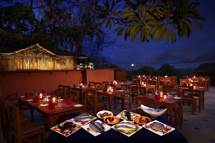 Imagen del bar/restaurante del Hotel Pride Sun Village Resort and Spa. Foto 5