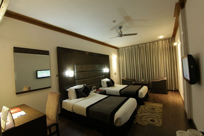 Imagen de la habitación del Hotel Pride Surya Mountain Resort Dharamshala. Foto 16