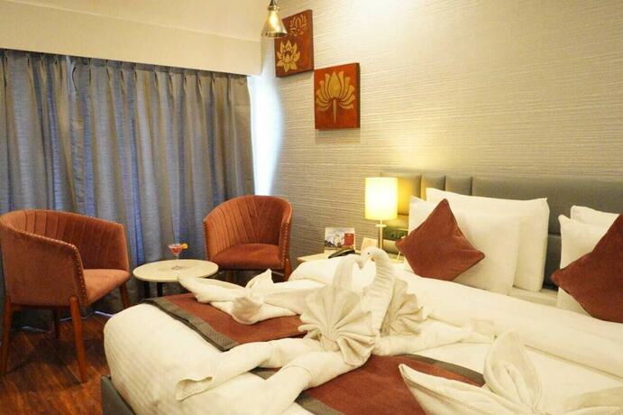 Imagen de la habitación del Hotel Pride Surya Mountain Resort Dharamshala. Foto 18