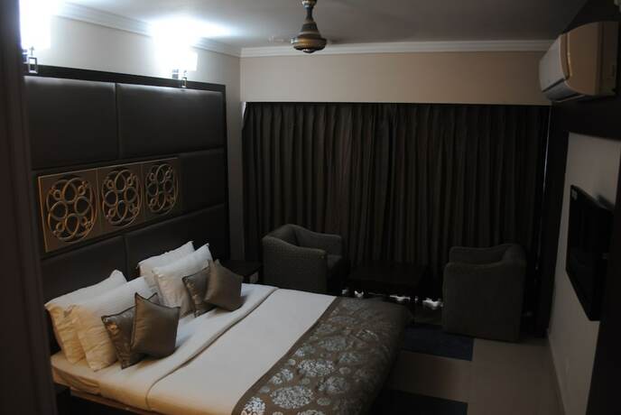 Imagen de la habitación del Hotel Pride Surya Mountain Resort Dharamshala. Foto 19