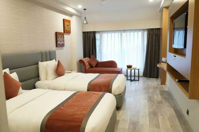 Imagen de la habitación del Hotel Pride Surya Mountain Resort Dharamshala. Foto 21