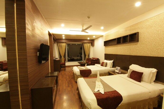 Imagen de la habitación del Hotel Pride Surya Mountain Resort Dharamshala. Foto 24