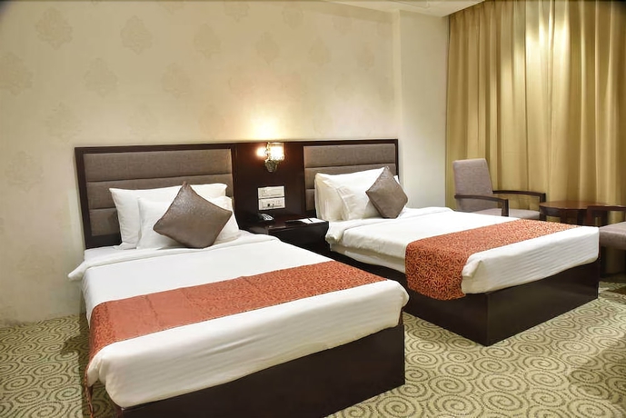 Imagen de la habitación del Hotel Pride and Convention Centre Indore. Foto 5