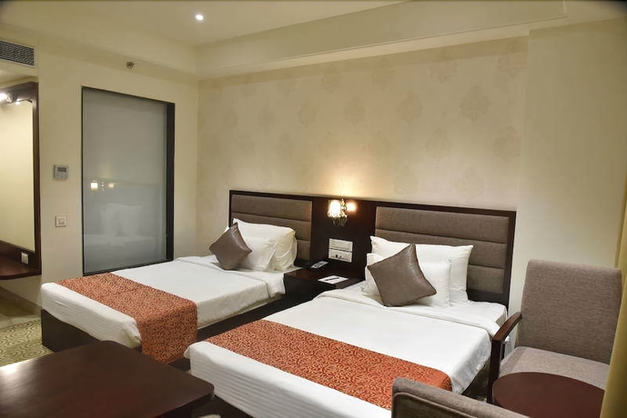 Imagen de la habitación del Hotel Pride and Convention Centre Indore. Foto 12