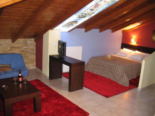 Imagen de la habitación del Hotel Prigipikon Suites and sofites. Foto 6