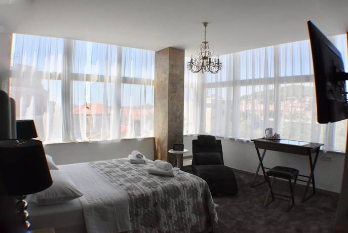 Imagen de la habitación del Hotel Prima Luce Downtown. Foto 16