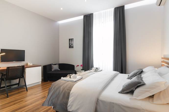 Imagen de la habitación del Hotel Prima Luxury Rooms. Foto 5