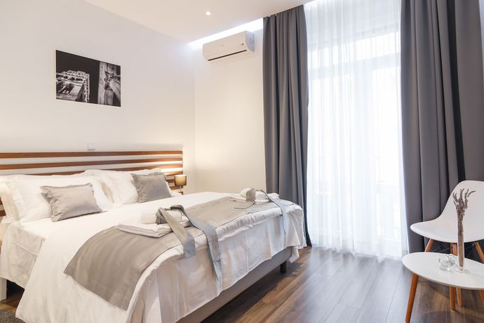 Imagen de la habitación del Hotel Prima Luxury Rooms. Foto 16