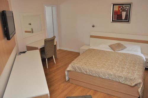 Imagen de la habitación del Hotel Prima, Pristina. Foto 6