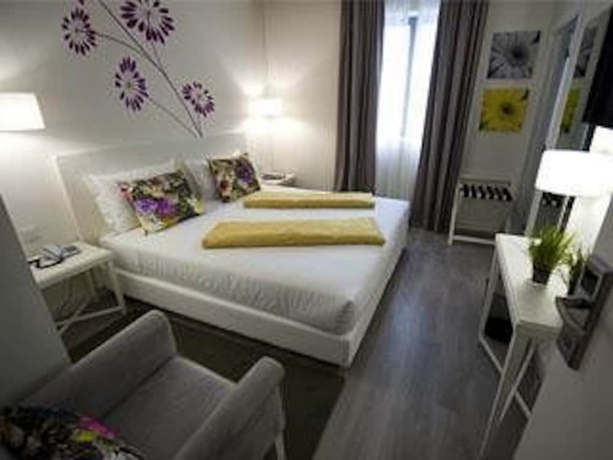 Imagen de la habitación del Hotel Primavera Perfume. Foto 11