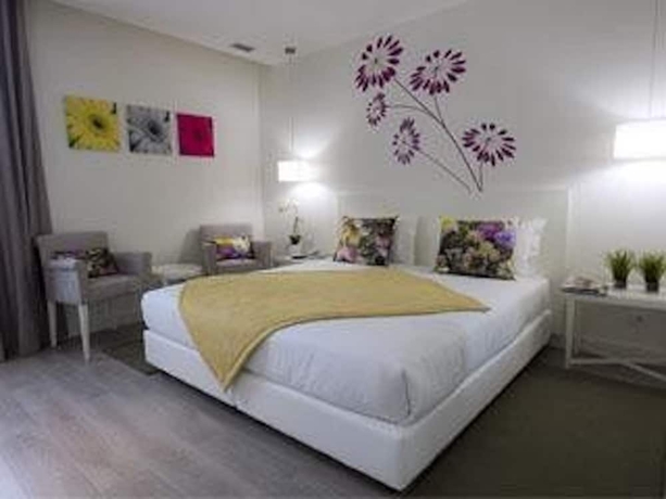 Imagen de la habitación del Hotel Primavera Perfume. Foto 12