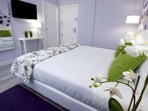 Imagen de la habitación del Hotel Primavera Perfume. Foto 16