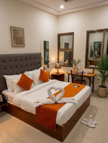Imagen de la habitación del Hotel Prime Access Inn. Foto 11