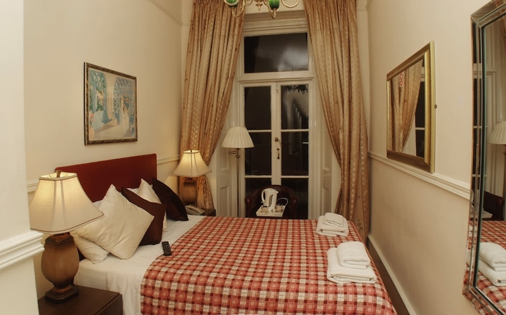 Imagen de la habitación del Hotel Prime Inn. Foto 16