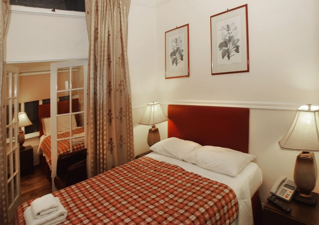 Imagen de la habitación del Hotel Prime Inn, Londres. Foto 4