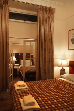 Imagen de la habitación del Hotel Prime Inn, Londres. Foto 6