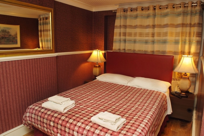 Imagen de la habitación del Hotel Prime Inn, Londres. Foto 11
