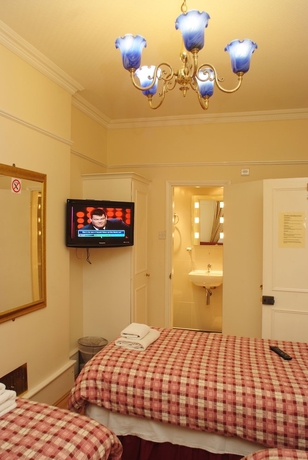 Imagen de la habitación del Hotel Prime Inn, Londres. Foto 12