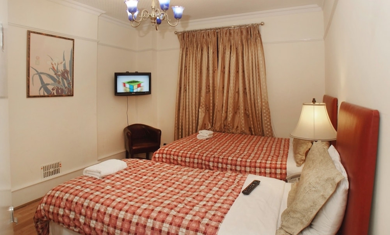 Imagen de la habitación del Hotel Prime Inn, Londres. Foto 13