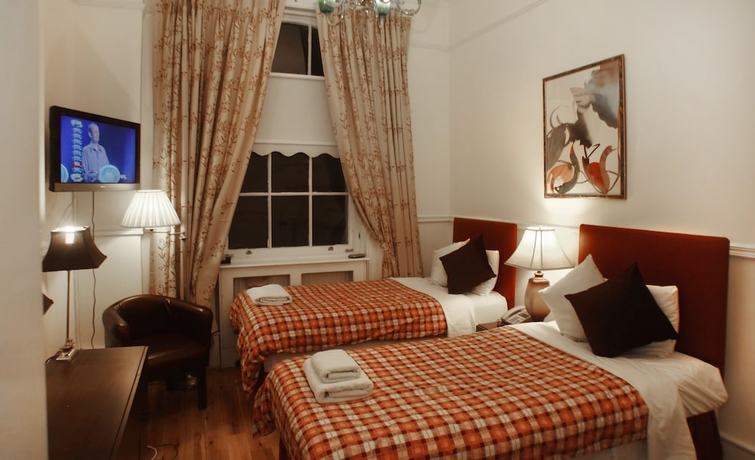 Imagen de la habitación del Hotel Prime Inn, Londres. Foto 14