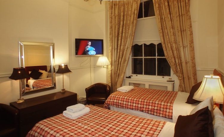 Imagen de la habitación del Hotel Prime Inn, Londres. Foto 15