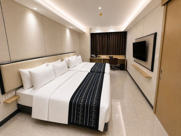 Imagen de la habitación del Hotel Prime Plaza Mataram. Foto 7