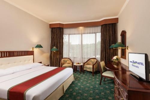 Imagen de la habitación del Hotel Prime Plaza Purwakarta. Foto 6