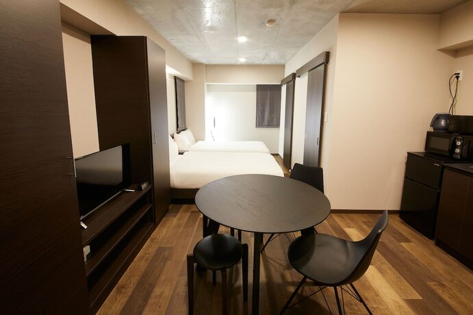 Imagen de la habitación del Hotel Prime Suites Tokyo. Foto 21