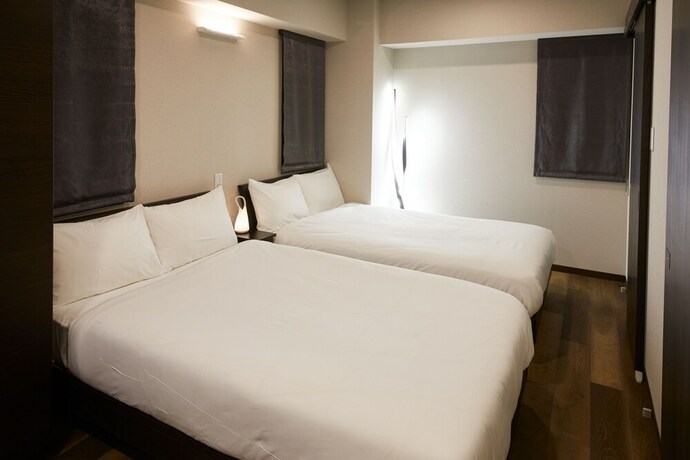 Imagen de la habitación del Hotel Prime Suites Tokyo. Foto 22