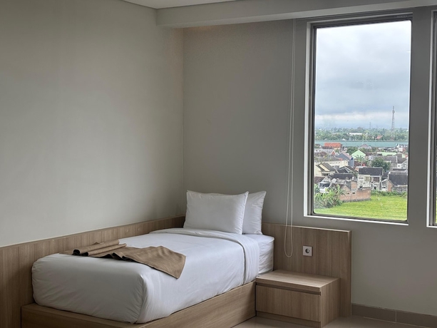 Imagen de la habitación del Hotel Prime UMY Convention and Dormitory. Foto 2