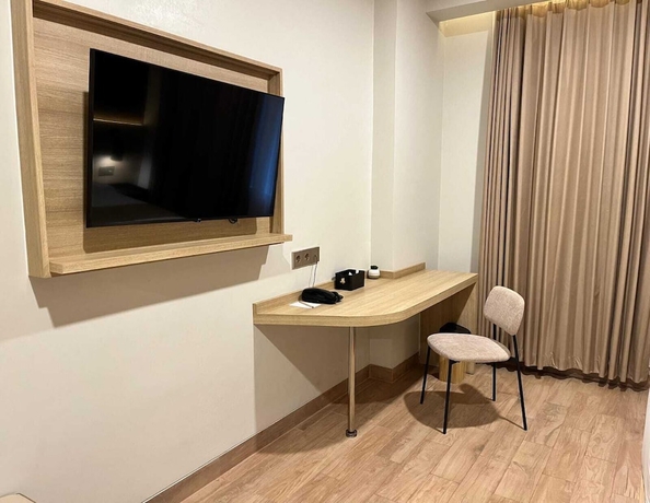 Imagen de la habitación del Hotel Prime UMY Convention and Dormitory. Foto 10