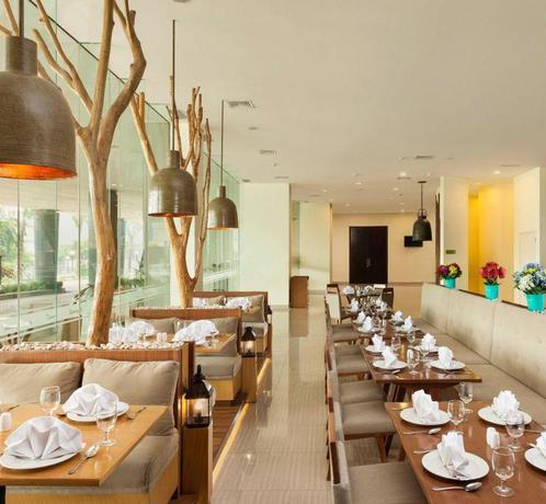 Imagen del bar/restaurante del Hotel Primebiz Cikarang. Foto 7